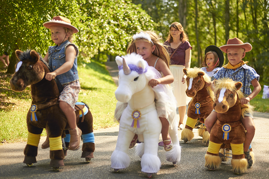 kid riding horse toy