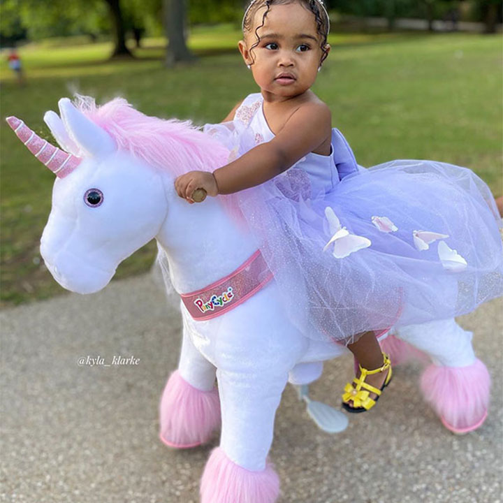 Princess loves her unicorn toy