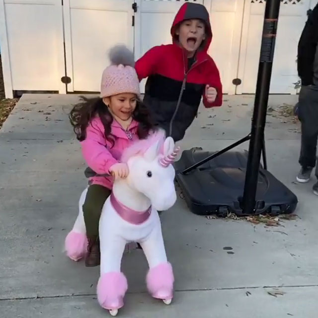 Surprise! Got her unicorn ride on toy!